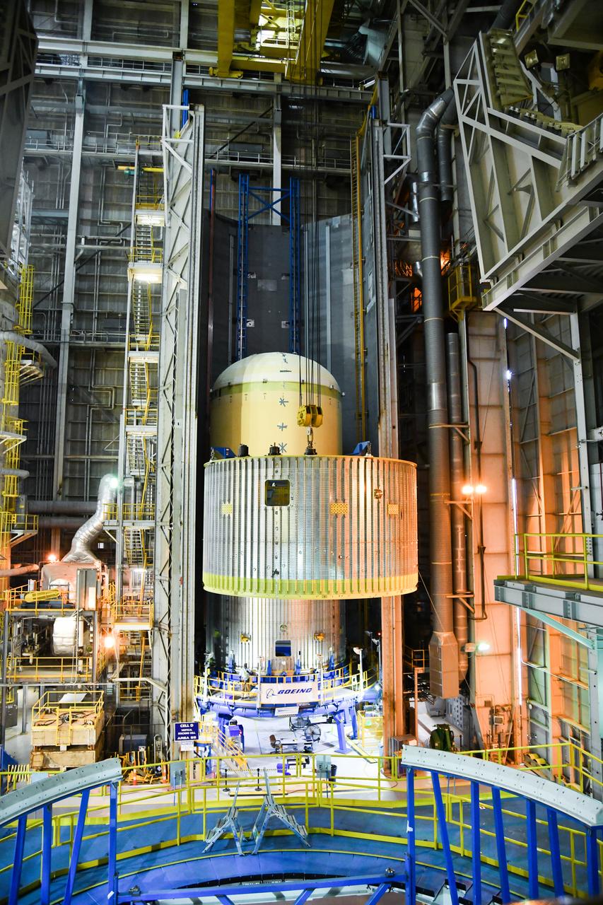 The Space Launch System (SLS) rocket’s liquid oxygen tank structural test article was manufactured and stacked in June 2019 at NASA’s Michoud Assembly Facility in New Orleans. To construct the test article, Boeing technicians at Michoud moved the liquid oxygen tank to the Vertical Assemby Building stacking and integration area. Here, they added simulators to mimic the two structures that connect to the tank, the intertank and the forward skirt.  This structural hardware for the SLS core stage for America’s new deep space rocket is structurally identical to the flight version of the tank. It will be shipped on the Pegasus barge to NASA’s Marshall Space Flight Center in Hunstville, Alabama, where it will undergo a series of tests that simulate the stresses and loads of liftoff and flight. These tests will help ensure designs are adequate for successful SLS missions to the Moon and beyond. The flight liquid oxygen tank along with the liquid hydrogen tank supplies more than 500,000 gallons of propellant to the core stages four RS-25 engines, which produce 2 million pounds of thrust to help send the SLS rocket to space.